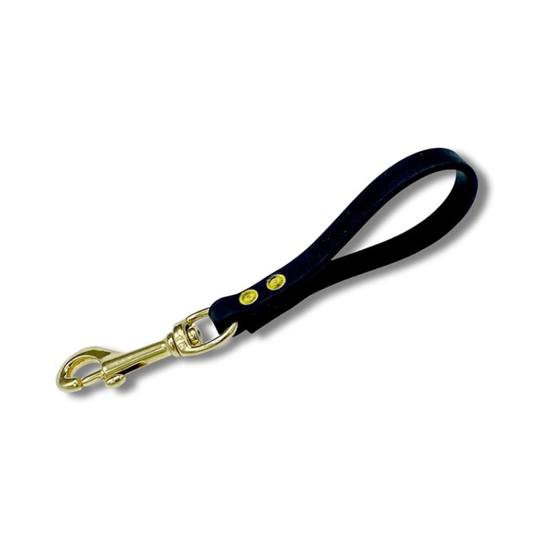 Black Biothane pull tab for dog training featuring durable brass snap hook and waterproof material for control and safety.