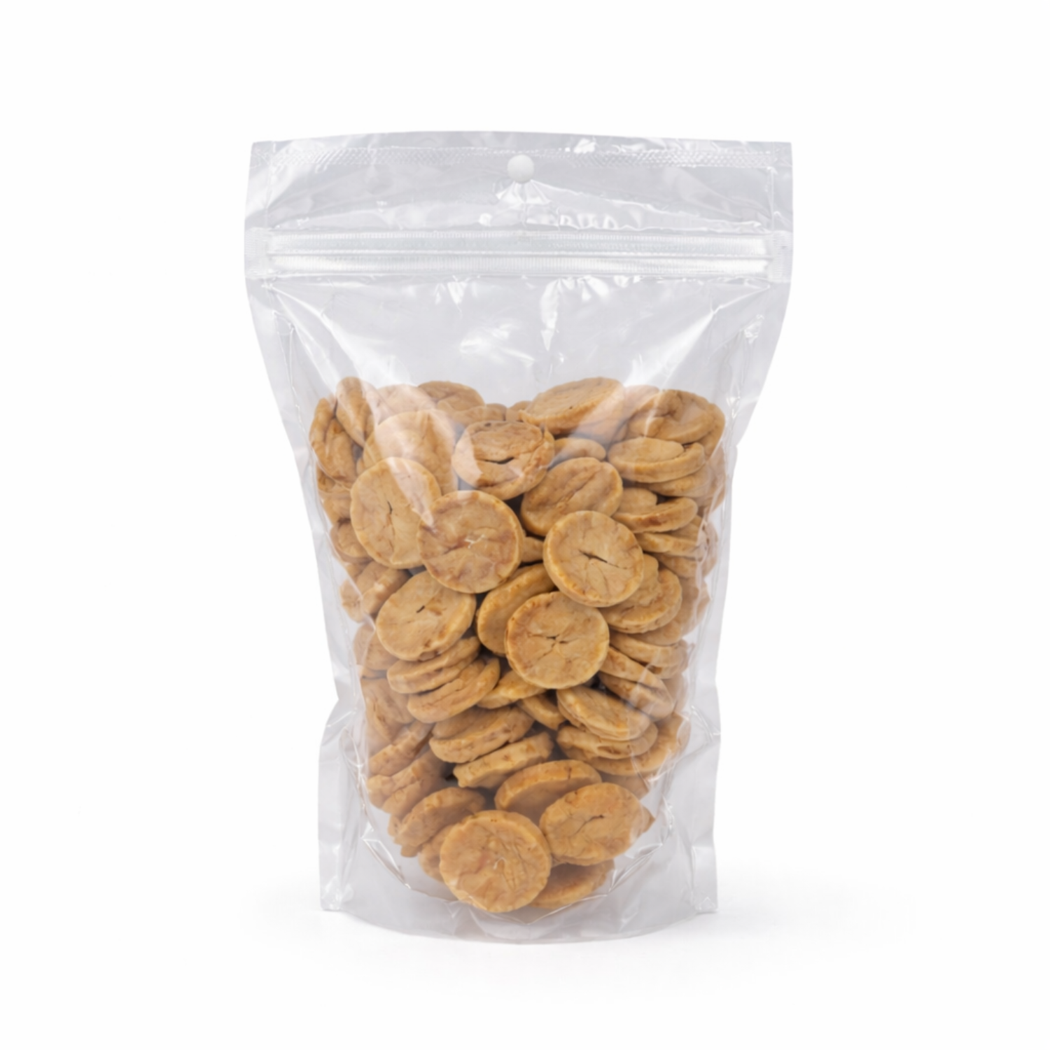 Transparent resealable bag filled with chicken breast dog training treats on a white background